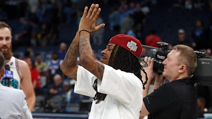 Apr 13, 2025; Memphis, Tennessee, USA; Memphis Grizzlies guard Ja Morant (12) reacts after defeating the Dallas Mavericks at FedExForum. Mandatory Credit: Petre Thomas-Imagn Images Apr 13, 2025; Memphis, Tennessee, USA; Memphis Grizzlies guard Ja Morant (12) reacts after defeating the Dallas Mavericks at FedExForum. Mandatory Credit: Petre Thomas-Imagn Images