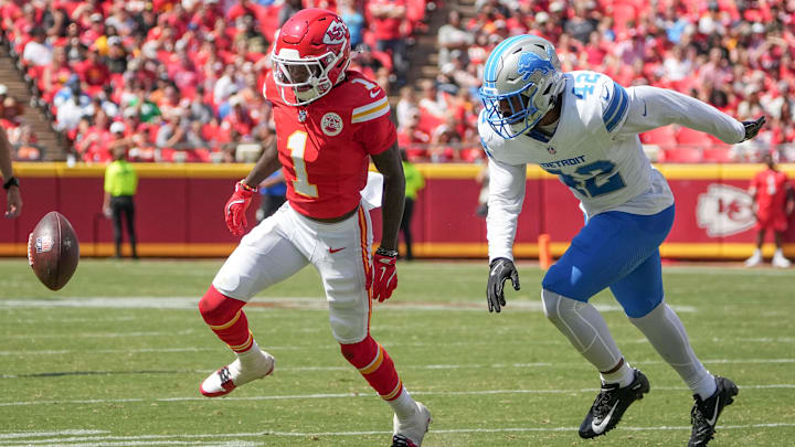 Aug 17, 2024; Kansas City, Missouri, USA; Detroit Lions linebacker Jalen Reeves-Maybin (42) breaks up a pass intended for Kansas City Chiefs wide receiver Xavier Worthy (1) during the first half at GEHA Field at Arrowhead Stadium. Mandatory Credit: Denny Medley-Imagn Images