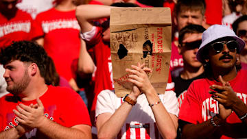 A Wisconsin Badger fan wears a bag on his head in the first half at Camp Randall Stadium on Saturday, Oct. 18, 2025 in Madison, Wisconsin.
