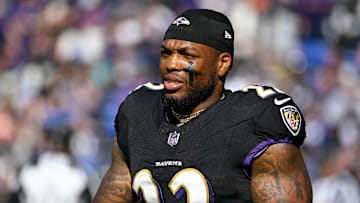 Oct 26, 2025; Baltimore, Maryland, USA; Baltimore Ravens running back Derrick Henry (22) looks on at halftime against the Chicago Bears at M&T Bank Stadium. 