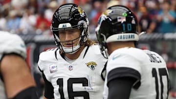 Sep 29, 2024; Houston, Texas, USA;  Jacksonville Jaguars quarterback Mac Jones (10) celebrates quarterback Trevor Lawrence (16) touchdown pass against the Houston Texans in the first quarter at NRG Stadium. 
