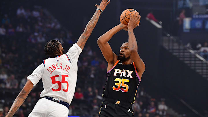Oct 31, 2024; Inglewood, California, USA; Phoenix Suns forward Kevin Durant (35) shoots against Los Angeles Clippers forward Derrick Jones Jr. (55) during the first half at Intuit Dome. Mandatory Credit: Gary A. Vasquez-Imagn Images