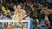 Mar 21, 2024; Charlotte, NC, USA; Texas Longhorns guard Chendall Weaver (2) dribbles around Colorado State Rams guard Isaiah Stevens (4) in the first round of the 2024 NCAA Tournament at Spectrum Center. Mandatory Credit: Bob Donnan-USA TODAY Sports