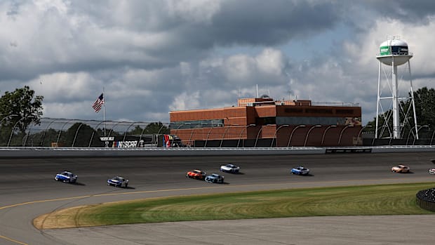 Kyle Busch (8) leads the field during the Fire Keepers 400 at Michigan International Speedway.