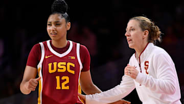 Feb 13, 2025; Los Angeles, California, USA; USC Trojans guard JuJu Watkins (12) talks to USC Trojans head coach Lindsay Gottliebduring an NCAA basketball game at Galen Center. Mandatory Credit: Robert Hanashiro-Imagn Images