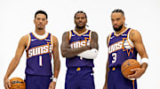 Sep 24, 2025; Phoenix, AZ, USA; Phoenix Suns guard Devin Booker (1), forward Dillon Brooks (3) and guard Jalen Green (4) pose for portrait during Media Day at PHX Arena. Mandatory Credit: Mark J. Rebilas-Imagn Images