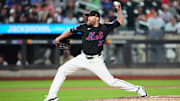 Jul 10, 2024; New York City, New York, USA; New York Mets pitcher Jake Diekman (30) delivers a pitch against the Washington Nationals during the seventh inning at Citi Field. Mandatory Credit: Gregory Fisher-Imagn Images
