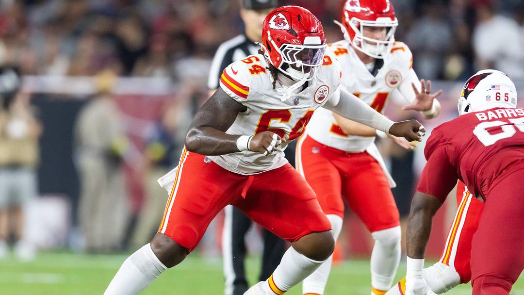 Aug 9, 2025; Glendale, Arizona, USA; Kansas City Chiefs offensive tackle Wanya Morris (64) against the Arizona Cardinals during a preseason NFL game at State Farm Stadium. Mandatory Credit: Mark J. Rebilas-Imagn Images