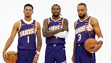 Sep 24, 2025; Phoenix, AZ, USA; Phoenix Suns guard Devin Booker (1), forward Dillon Brooks (3) and guard Jalen Green (4) pose for portrait during Media Day at PHX Arena. Mandatory Credit: Mark J. Rebilas-Imagn Images