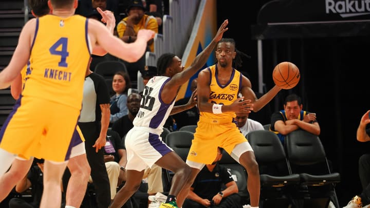 Jul 6, 2024; San Francisco, CA, USA; Los Angeles Lakers guard Sean East II (29) looks to pass the ball against Sacramento Kings guard Antoine Davis (36) during the second quarter at Chase Center. Mandatory Credit: Kelley L Cox-USA TODAY Sports