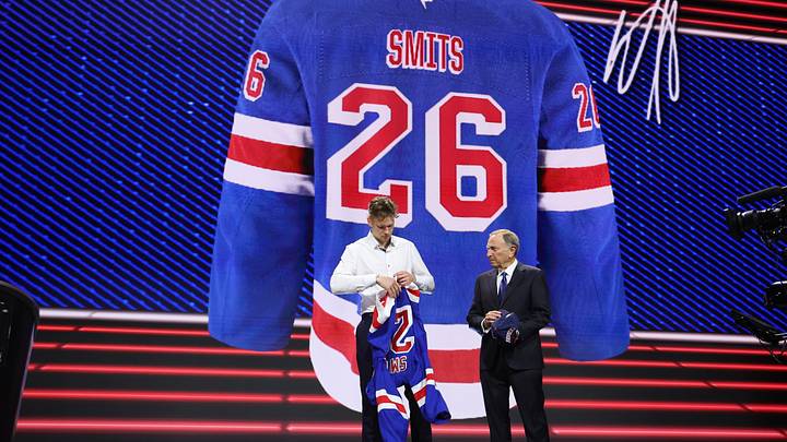 Jun 26, 2026; Buffalo, New York, USA; Alberts Smits reacts beside NHL commissioner Gary Bettman after being selected with the fifth pick in the first round of the 2026 NHL Draft by the New York Rangers at KeyBank Center. Mandatory Credit: Timothy T. Ludwig-Imagn Images Jun 26, 2026; Buffalo, New York, USA; Alberts Smits reacts beside NHL commissioner Gary Bettman after being selected with the fifth pick in the first round of the 2026 NHL Draft by the New York Rangers at KeyBank Center. Mandatory Credit: Timothy T. Ludwig-Imagn Images