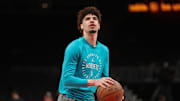 Mar 12, 2025; Atlanta, Georgia, USA; Charlotte Hornets guard LaMelo Ball (1) warms up on the court before the game against the Atlanta Hawks at State Farm Arena. Mandatory Credit: Mady Mertens-Imagn Images