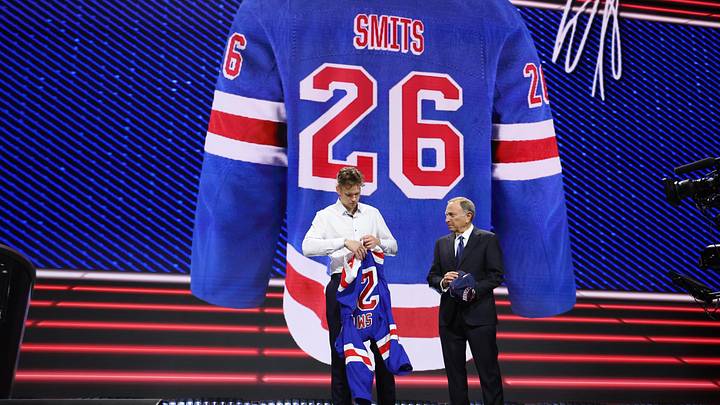 Jun 26, 2026; Buffalo, New York, USA; Alberts Smits reacts beside NHL commissioner Gary Bettman after being selected with the fifth pick in the first round of the 2026 NHL Draft by the New York Rangers at KeyBank Center. Mandatory Credit: Timothy T. Ludwig-Imagn Images Jun 26, 2026; Buffalo, New York, USA; Alberts Smits reacts beside NHL commissioner Gary Bettman after being selected with the fifth pick in the first round of the 2026 NHL Draft by the New York Rangers at KeyBank Center. Mandatory Credit: Timothy T. Ludwig-Imagn Images