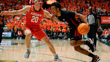 Jan 19, 2024; Fort Collins, Colorado, USA; UNLV Rebels guard Dedan Thomas Jr. (11) drives to the basket against Colorado State Rams guard Joe Palmer (20) in the first half at Moby Arena. Mandatory Credit: Isaiah J. Downing-Imagn Images