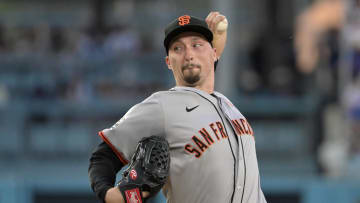 Jul 22, 2024; Los Angeles, California, USA;  San Francisco Giants starting pitcher Blake Snell (7) delivers to the plate in the second inning against the Los Angeles Dodgers at Dodger Stadium. Mandatory Credit: Jayne Kamin-Oncea-USA TODAY Sports