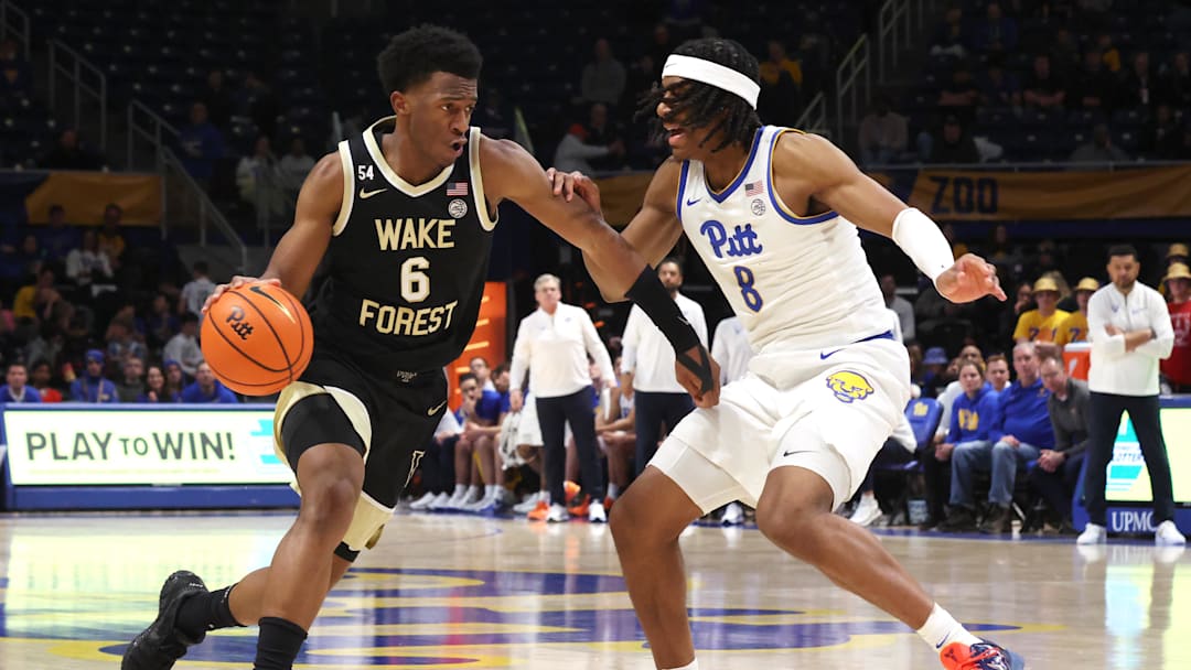 Jan 27, 2026; Pittsburgh, Pennsylvania, USA;  Wake Forest Demon Deacons guard Myles Colvin (6) drives to the basket against Pittsburgh Panthers guard Omari Witherspoon (8) during the second half at the Petersen Events Center. Mandatory Credit: Charles LeClaire-Imagn Images