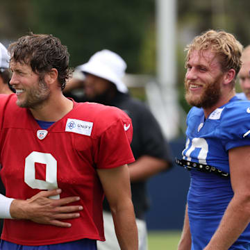 Aug 1, 2024; Los Angeles, CA, USA;  Los Angeles Rams quarterback Matthew Stafford (9) talks with wide receiver Cooper Kupp (10) and wide receiver Puka Nacua (17) during training camp at Loyola Marymount University. Mandatory Credit: Kiyoshi Mio-Imagn Images