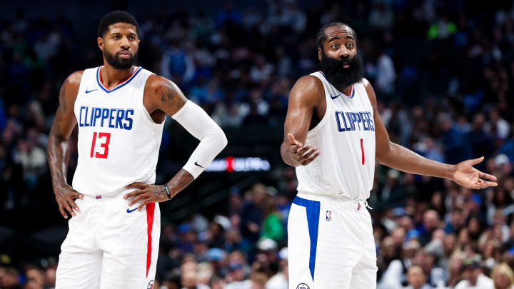 Nov 10, 2023; Dallas, Texas, USA;  LA Clippers guard James Harden (1) and LA Clippers forward Paul George (13) react against during the second half against the Dallas Mavericks at American Airlines Center. 