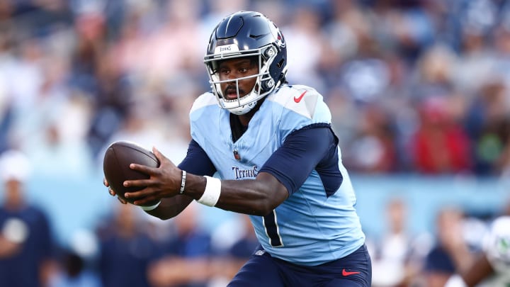 Aug 17, 2024; Nashville, Tennessee, USA; Tennessee Titans quarterback Malik Willis (7) catches a snap in the second quarter of the game agains the Seattle Seahawks at Nissan Stadium. Mandatory Credit: Casey Gower-USA TODAY Sports