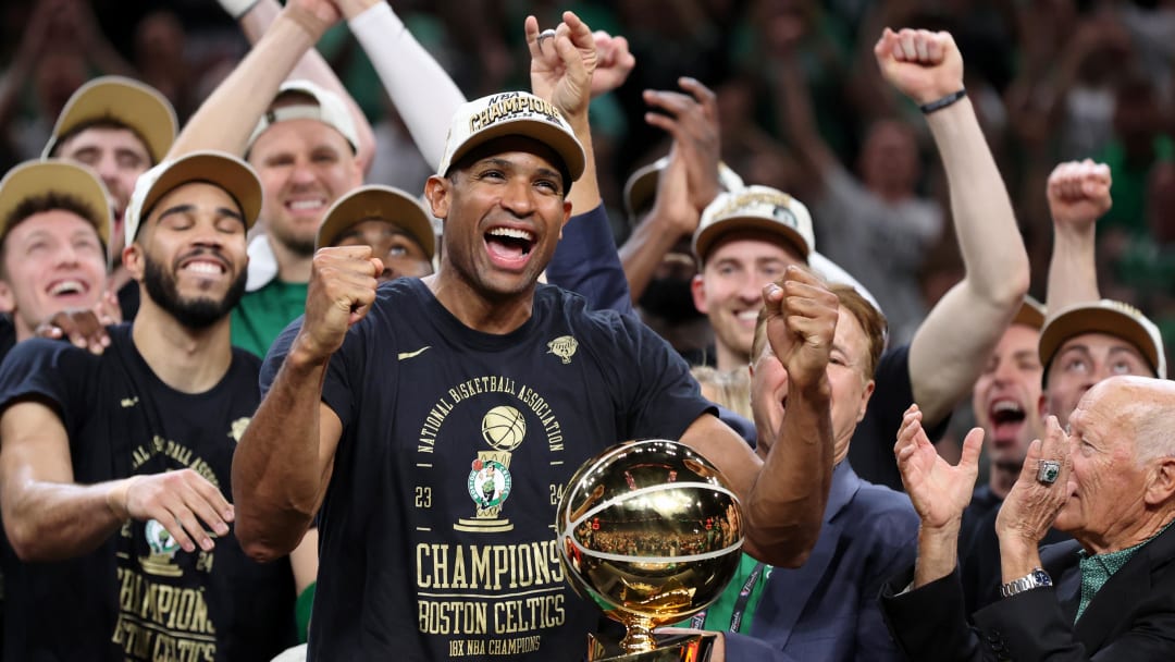 Jun 17, 2024; Boston, Massachusetts, USA; Boston Celtics center Al Horford (42) celebrates after winning the 2024 NBA Finals against the Dallas Mavericks at TD Garden. Mandatory Credit: Peter Casey-USA TODAY Sports