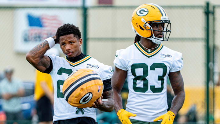 Green Bay Packers wide receiver Matthew Golden (22) and wide receiver Savion Williams (83) prepare to run a drill during the second day of training camp on Thursday, July 24, 2025, at Ray Nitschke Field in Ashwaubenon, Wis.