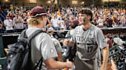 Texas A&M Aggies right fielder Jace Laviolette greets players after the loss against the Tennessee Volunteers.