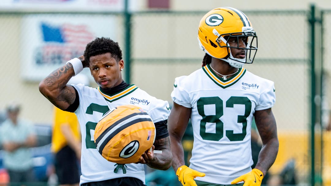 Green Bay Packers wide receiver Matthew Golden (22) and wide receiver Savion Williams (83) prepare to run a drill during the second day of training camp on Thursday, July 24, 2025, at Ray Nitschke Field in Ashwaubenon, Wis.