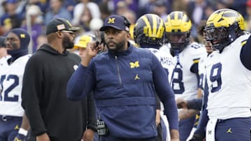 Nov 15, 2025; Chicago, Illinois, USA; Michigan Wolverines head coach Sherrone Moore on the sidelines against the Northwestern Wildcats during the first half at Wrigley Field. Mandatory Credit: David Banks-Imagn Images
