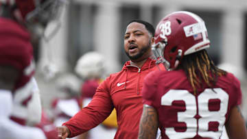 Mar 21, 2024; Tuscaloosa, Alabama, USA; Alabama co-defensive coordinator Maurice Linguist directs players during practice at the University Alabama Thursday.