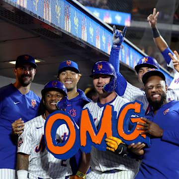 New York Mets first baseman Pete Alonso (20) celebrates his three run home run against the Washington Nationals with starting pitcher David Peterson (23) and shortstop Luisangel Acuna (2) and starting pitcher Jose Quintana (62) and second baseman Jose Iglesias (11) starting pitcher Luis Severino (40) and right fielder Starling Marte (6) and shortstop Francisco Lindor (12) during the sixth inning at Citi Field on Sept 16.