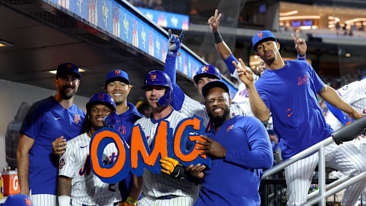 New York Mets first baseman Pete Alonso (20) celebrates his three run home run against the Washington Nationals with starting pitcher David Peterson (23) and shortstop Luisangel Acuna (2) and starting pitcher Jose Quintana (62) and second baseman Jose Iglesias (11) starting pitcher Luis Severino (40) and right fielder Starling Marte (6) and shortstop Francisco Lindor (12) during the sixth inning at Citi Field on Sept 16.