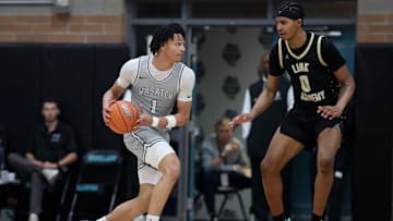 Houston basketball signee Isiah Harwell (left) goes up against another future Cougar, Chris Cenac
