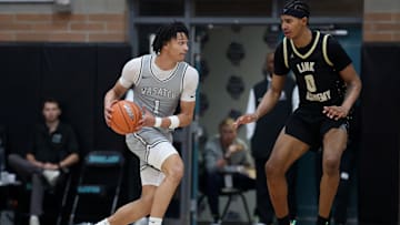 Houston basketball signee Isiah Harwell (left) goes up against another future Cougar, Chris Cenac