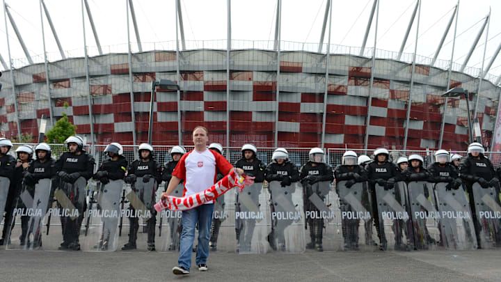 A Polish supporter walks in front of rio