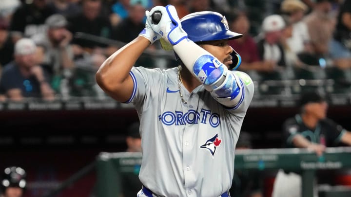 Jul 12, 2024; Phoenix, Arizona, USA; Toronto Blue Jays first base Vladimir Guerrero Jr. (27) bats against the Arizona Diamondbacks during the first inning at Chase Field.