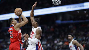 Nov 17, 2024; Washington, District of Columbia, USA; Washington Wizards guard Malcolm Brogdon (15) shoots the ball as Detroit Pistons guard Jaden Ivey (23): Geoff Burke-Imagn Images