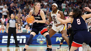 Apr 6, 2025; Tampa, FL, USA; Connecticut Huskies guard Paige Bueckers (5) has the ball against the South Carolina Gamecocks during the second half of the national championship of the women's 2025 NCAA tournament at Amalie Arena. Mandatory Credit: Nathan Ray Seebeck-Imagn Images