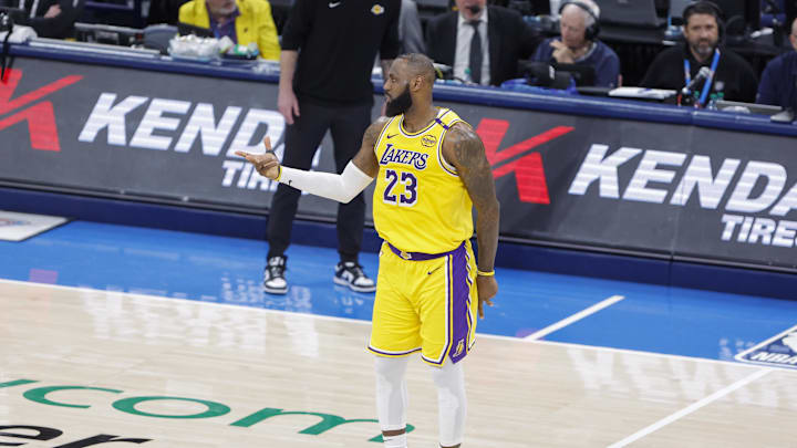 James gestures after scoring. James gestures after scoring.