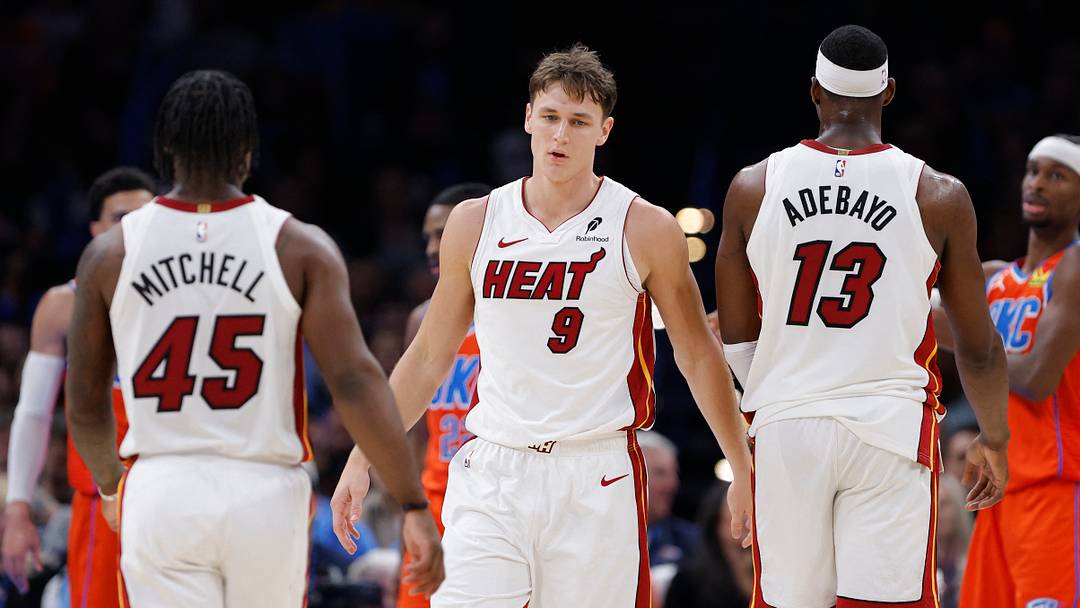 Jan 11, 2026; Oklahoma City, Oklahoma, USA; Miami Heat guard Davion Mitchell (45), guard Pelle Larsson (9), and center/forward Bam Adebayo (13) stand after a play against the Oklahoma City Thunder during the second half at Paycom Center. Mandatory Credit: Alonzo Adams-Imagn Images Jan 11, 2026; Oklahoma City, Oklahoma, USA; Miami Heat guard Davion Mitchell (45), guard Pelle Larsson (9), and center/forward Bam Adebayo (13) stand after a play against the Oklahoma City Thunder during the second half at Paycom Center. Mandatory Credit: Alonzo Adams-Imagn Images