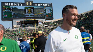 Oregon Head Coach Dan Lanning leaves the field after the win over Oklahoma State at Autzen.