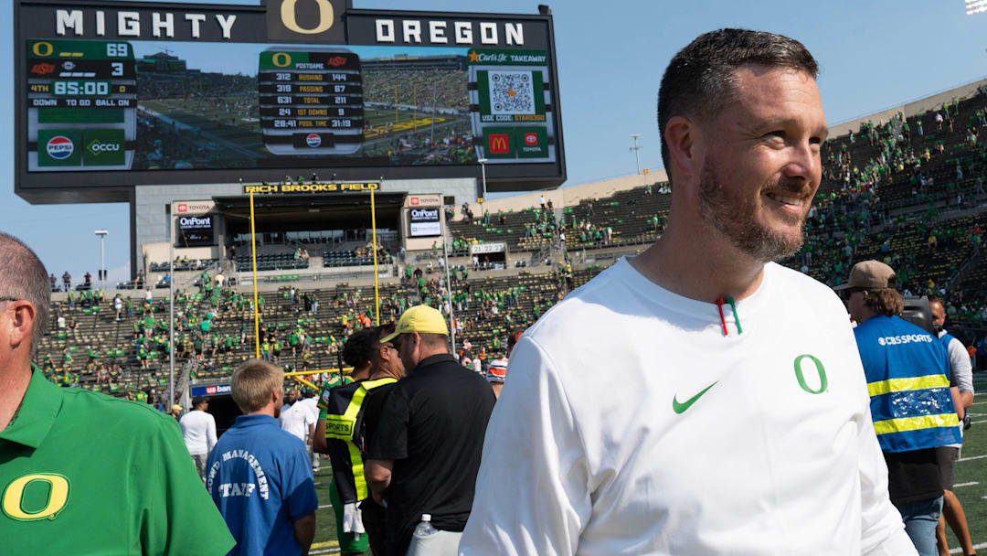 Oregon Head Coach Dan Lanning leaves the field after the win over Oklahoma State at Autzen.