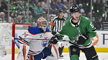May 29, 2025; Dallas, Texas, USA; Edmonton Oilers defenseman Alec Regula (75) and Dallas Stars center Wyatt Johnston (53) in action during the game between the Dallas Stars and the Edmonton Oilers in game five of the Western Conference Final of the 2025 Stanley Cup Playoffs at American Airlines Center. Mandatory Credit: Jerome Miron-Imagn Images