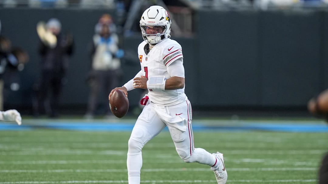 Dec 22, 2024; Charlotte, North Carolina, USA; Arizona Cardinals quarterback Kyler Murray (1) runs out of the pocket against the Carolina Panthers during the second half at Bank of America Stadium. Mandatory Credit: Jim Dedmon-Imagn Images