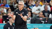 Jul 30, 2024; Villeneuve-d'Ascq, France; Germany head coach Gordie Fin Herbert talks to his team during the game against Brazil in men’s basketball group B play during the Paris 2024 Olympic Summer Games at Stade Pierre-Mauroy. Mandatory Credit: John David Mercer-Imagn Images