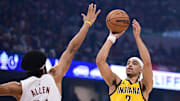 Indiana Pacers guard Andrew Nembhard (2) shoots over the defense of Cleveland Cavaliers center Jarrett Allen (31) during the first half in game one of the second round for the 2025 NBA Playoffs at Rocket Arena.