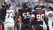 Nov 9, 2025; Houston, Texas, USA; Houston Texans defensive end Danielle Hunter (55) celebrates with defensive tackle Sheldon Rankins (90) during the game against the Jacksonville Jaguars at NRG Stadium. Mandatory Credit: Troy Taormina-Imagn Images