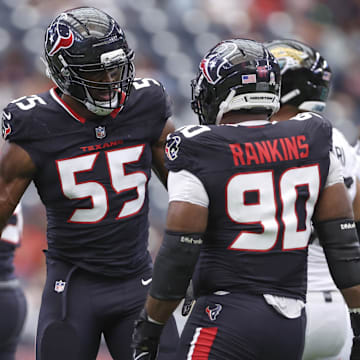 Nov 9, 2025; Houston, Texas, USA; Houston Texans defensive end Danielle Hunter (55) celebrates with defensive tackle Sheldon Rankins (90) during the game against the Jacksonville Jaguars at NRG Stadium. Mandatory Credit: Troy Taormina-Imagn Images