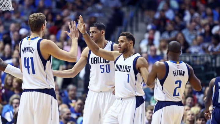 Apr 8, 2016; Dallas, TX, USA; Dallas Mavericks forward Dirk Nowitzki (41) high fives guard Justin Anderson (1) during the first half against the Memphis Grizzlies at American Airlines Center. Mandatory Credit: Kevin Jairaj-USA TODAY Sports