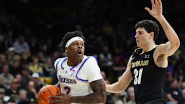 Feb 24, 2025; Boulder, Colorado, USA; Colorado Buffaloes guard Harrison Carrington (31) defends on Kansas Jayhawks guard AJ Storr (2) in the first half at the CU Events Center. 