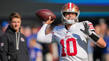 Nov 2, 2025; East Rutherford, New Jersey, USA; San Francisco 49ers quarterback Mac Jones (10) warms up prior to a game against the New York Giants at MetLife Stadium. Mandatory Credit: Robert Deutsch-Imagn Images
